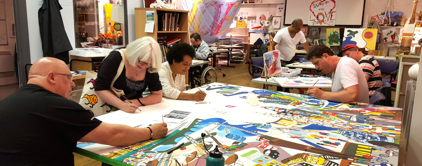 Give us the Meaning of Love Craft Workshops People Painting at Craft Workshop